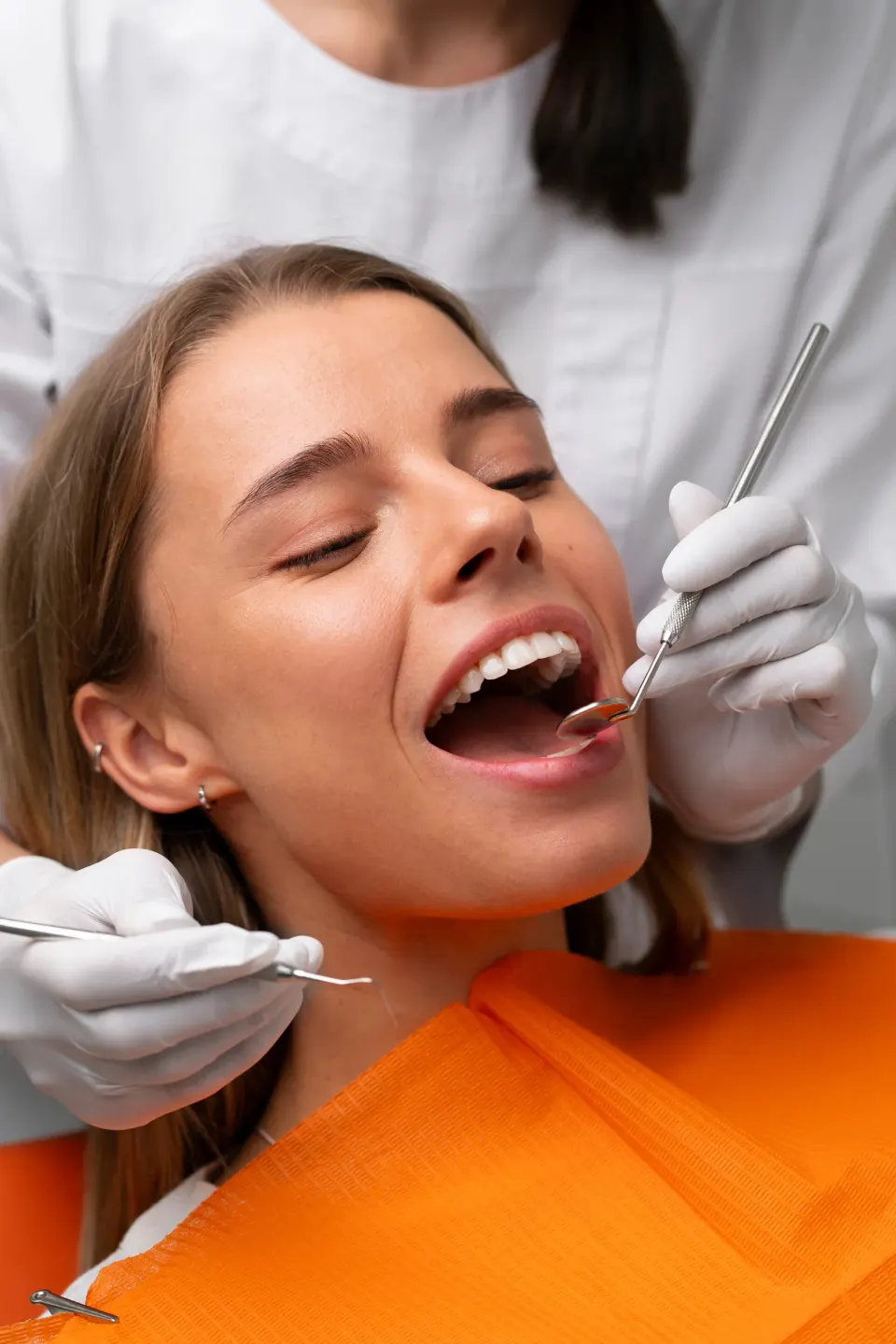 Patient consultation for wisdom tooth removal at Dental World Longwood