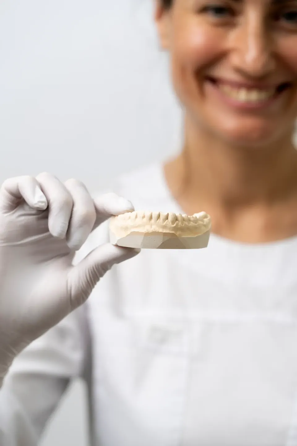 Patient consultation about dental crown benefits at Dental World Longwood