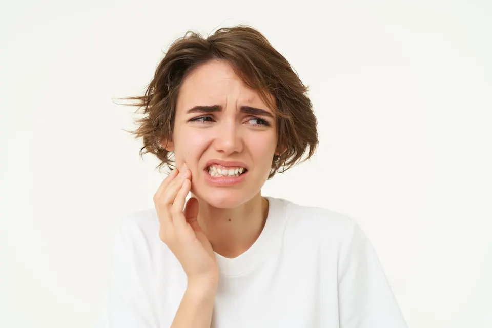 Patient noticing signs of receding gums at Dental World Longwood Florida