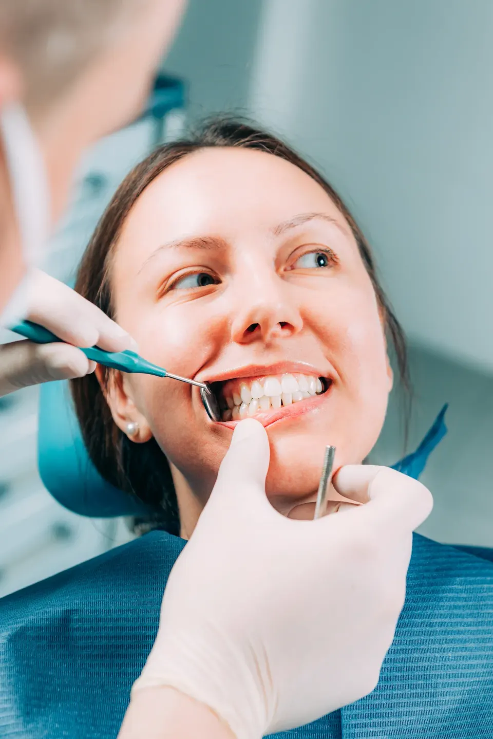 Confident patient portrait after wisdom tooth removal at Dental World Longwood