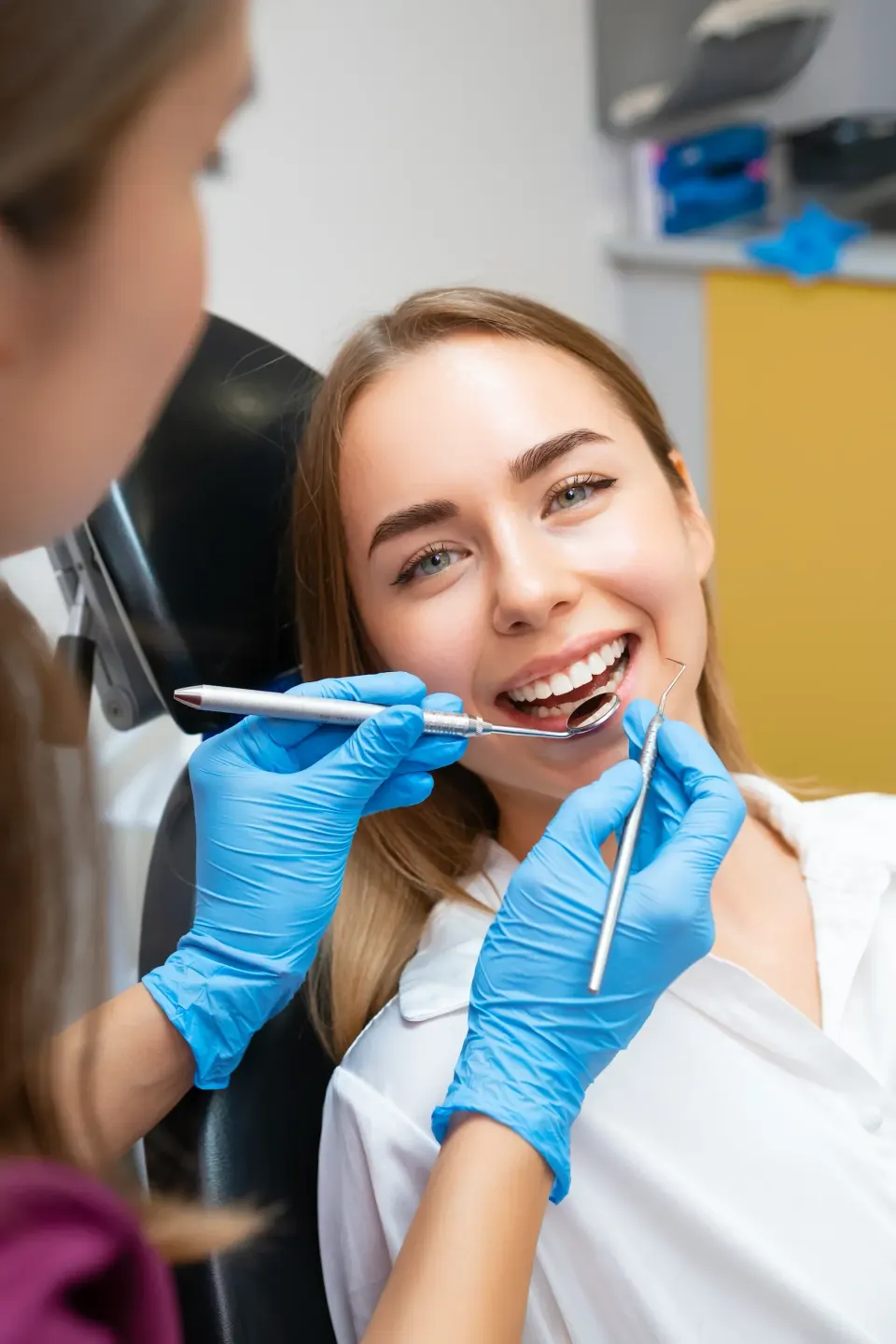 Patient and Dr. Manmode in comfortable consultation at Dental World Longwood Florida