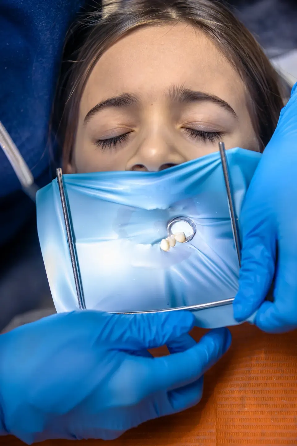Confident patient portrait after implant bridge at Dental World Longwood Florida