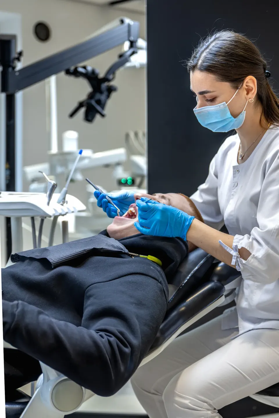 Confident patient portrait after dental cleaning at Dental World Longwood