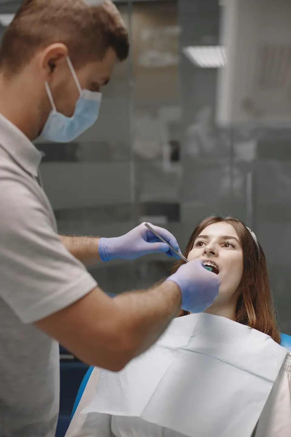 Confident patient portrait after dental crowns at Dental World Longwood