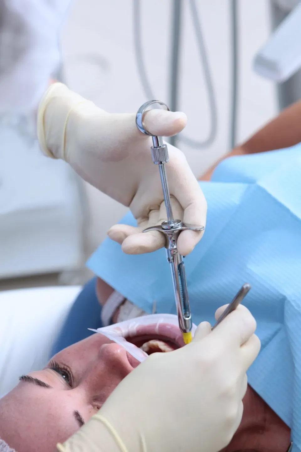 Patient and Dr. Manmode in comfortable consultation at Dental World Longwood Florida