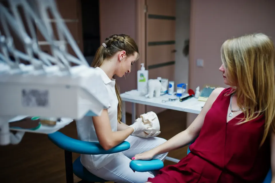Dental provider discussing IV sedation options with a patient at Dental World in Longwood, Florida before a dental procedure