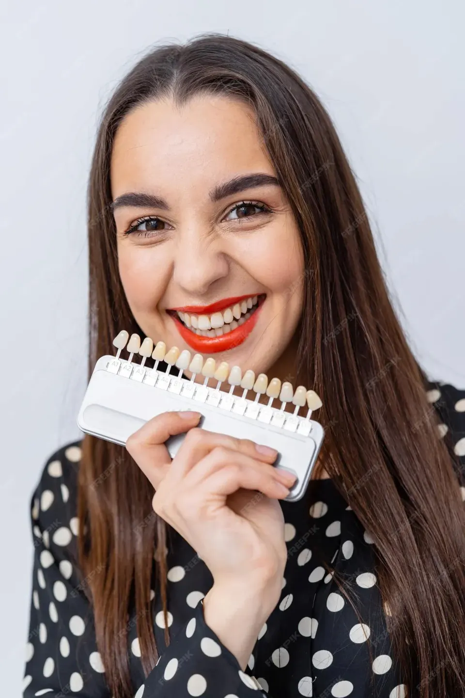 Confident patient portrait after dental veneers at Dental World Longwood
