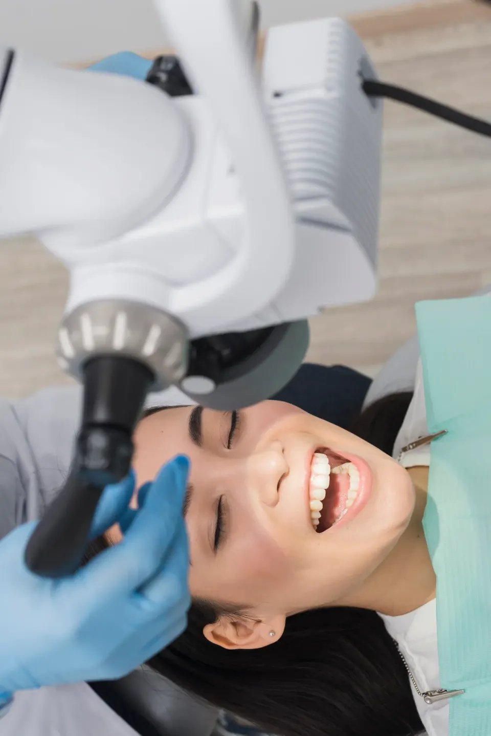 Confident patient portrait after gum disease treatment at Dental World Longwood