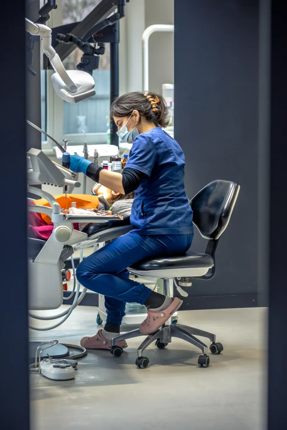Person concerned about tooth pain at Dental World Longwood