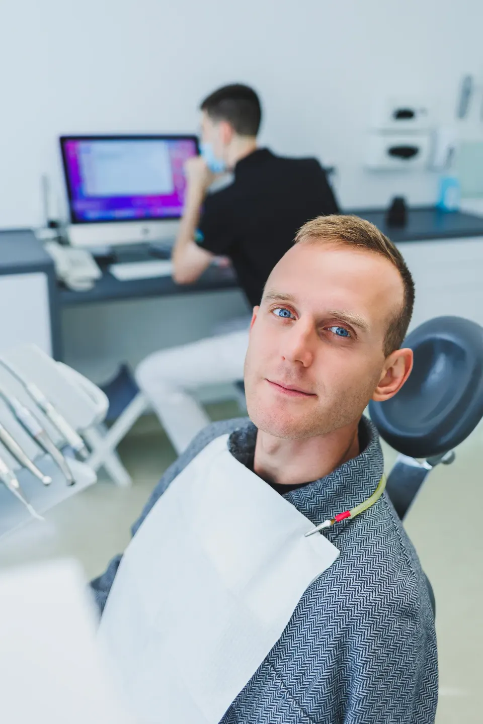 Patient and provider consultation about implant overdenture options at Dental World Longwood