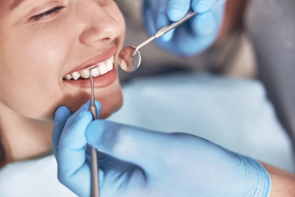 Dr. Sheetal Manmode discussing metal-free implant options with a patient at Dental World in Longwood FL